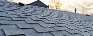 a close up of a gray shingled roof.