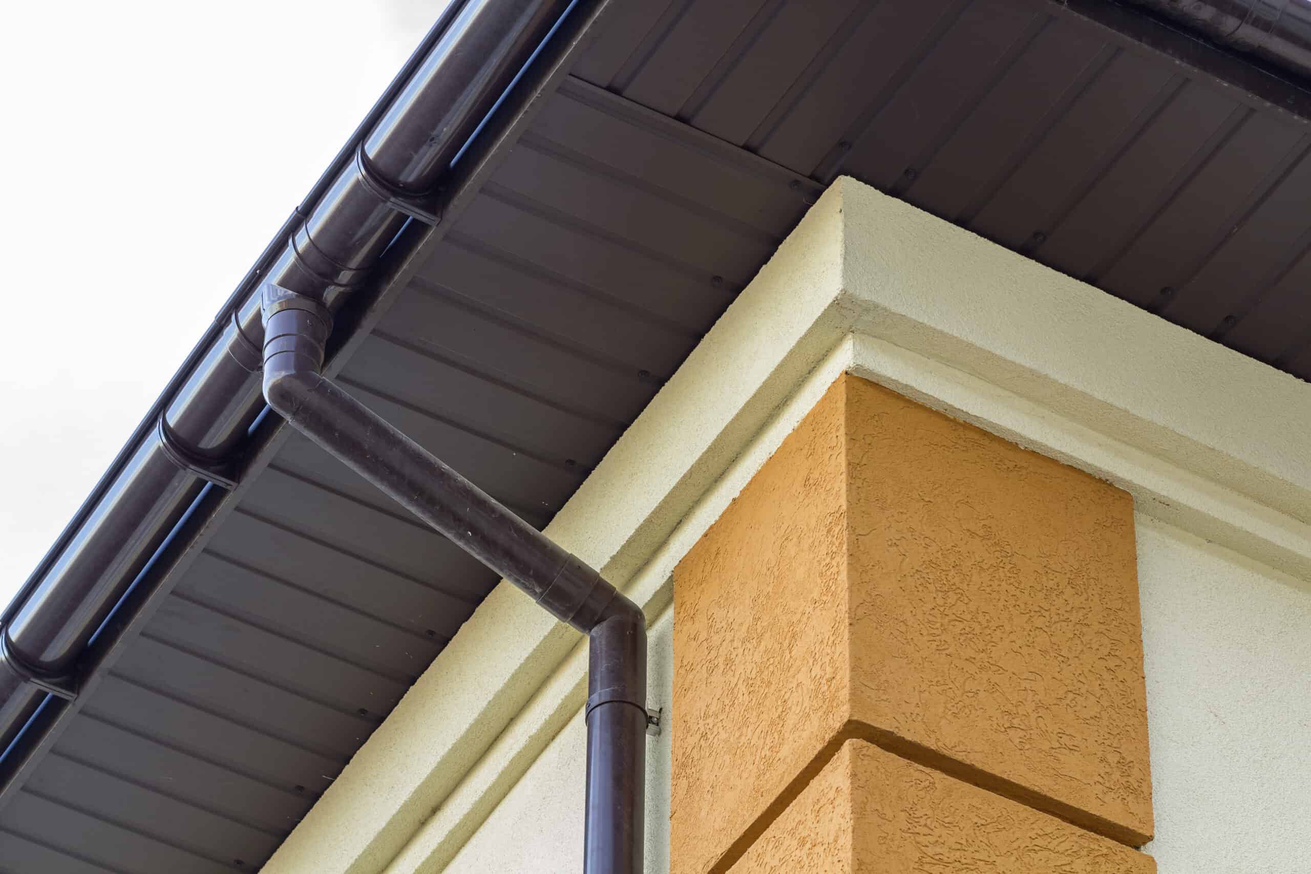 a close up view of a gutter on a building.
