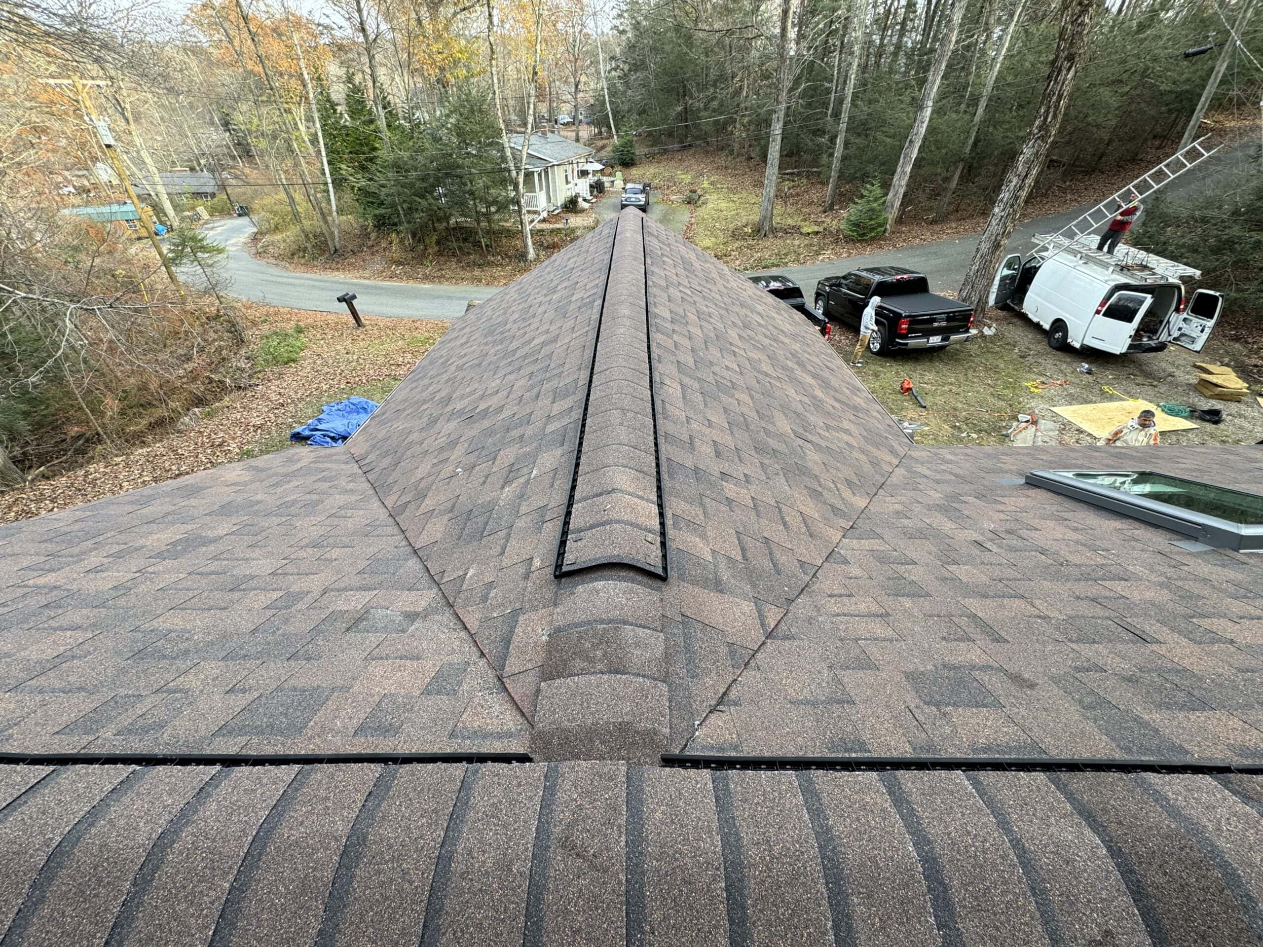 the roof of a house with shingles on it.